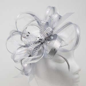 Shimmering silver fascinator with diamante. On a clip, comb or Alice band