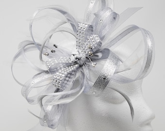 Shimmering silver fascinator with diamante. On a clip, comb or Alice band