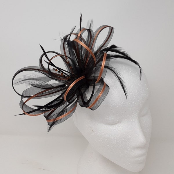 Black and copper fascinator with a touch of sparkling diamantè on clip, comb and Alice band.