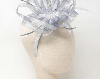 Metallic silver fascinator with centre bead cluster on comb, Alice band or clip.