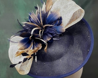 Navy Blue and Gold Architectural Hatinator with Flower and Sculptured Sinamay Bow