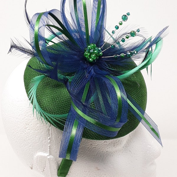 Emerald green and navy blue button percher style fasinator with beading