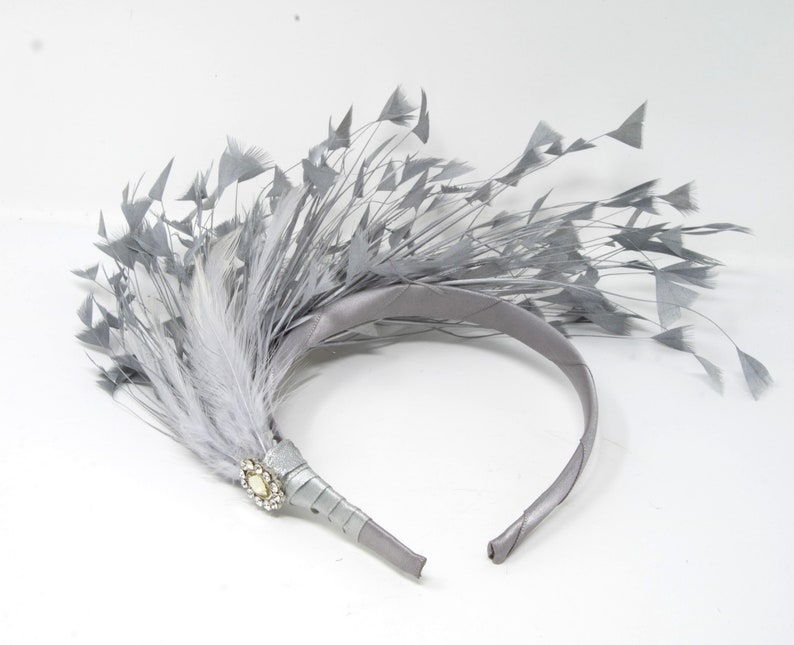 Silver feather and diamante/' Alice band fascinator