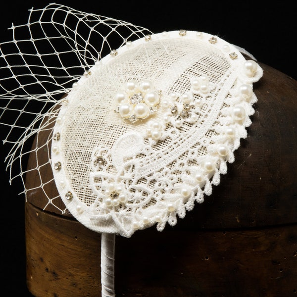 Ivory lace, pearl and crystal bridal wedding fascinator.