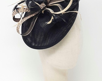 Black leopard print hatinator style fascinator on a clip, comb and Alice band