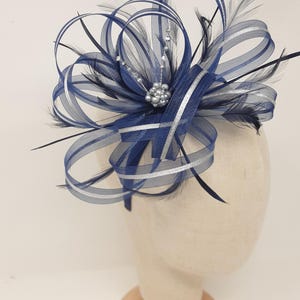 Navy Blue and silver fascinator with a touch of sparkling diamantè on clip, comb and Alice band.