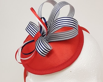 Red white and blue stripe patriot party fascinator attached to an Alice band