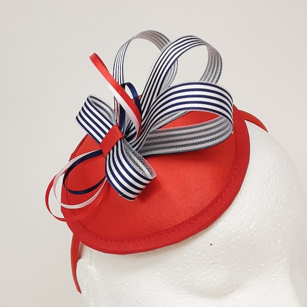 Red white and blue stripe patriot party fascinator attached to an Alice band