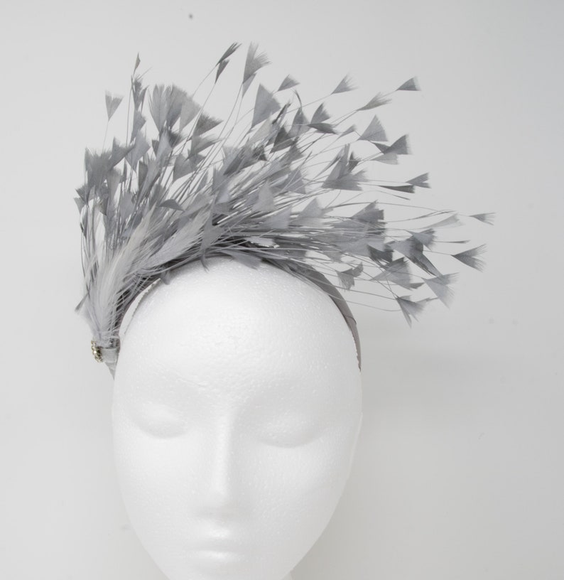Silver feather and diamante/' Alice band fascinator