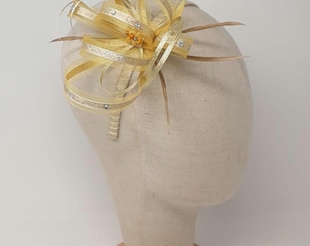 Sparkling gold fascinator with bead cluster and diamante' on a comb, Alice band and clip.