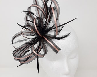 Black and rose gold fascinator with a touch of sparkling diamantè on clip, comb and Alice band.