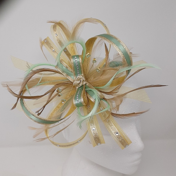 Shimmering gold and sage green  fascinator with diamante. On a clip, comb or Alice band