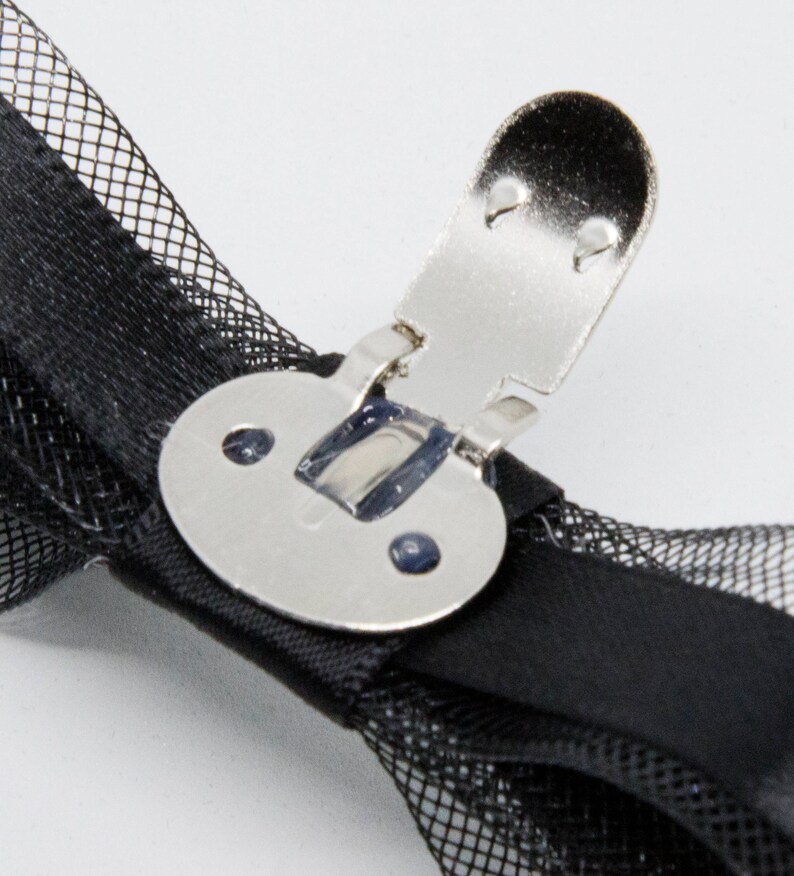 Black and sparkling diamant\u00e8 shoe clips