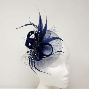 Navy blue beaded fascinator on a clip, comb and Alice band