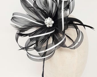Black and white fascinator with diamante' and centre pearl bead cluster on comb, Alice band or clip.