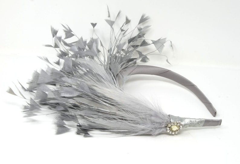 Silver feather and diamante/' Alice band fascinator