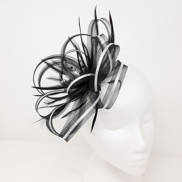 Black and silver fascinator with a touch of sparkling diamantè on clip, comb and Alice band.
