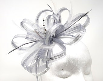 Metallic silver fascinator with centre bead cluster on comb, Alice band or clip.