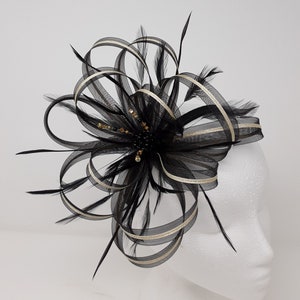 Black and gold fascinator with a touch of sparkling diamantè on clip, comb and Alice band.