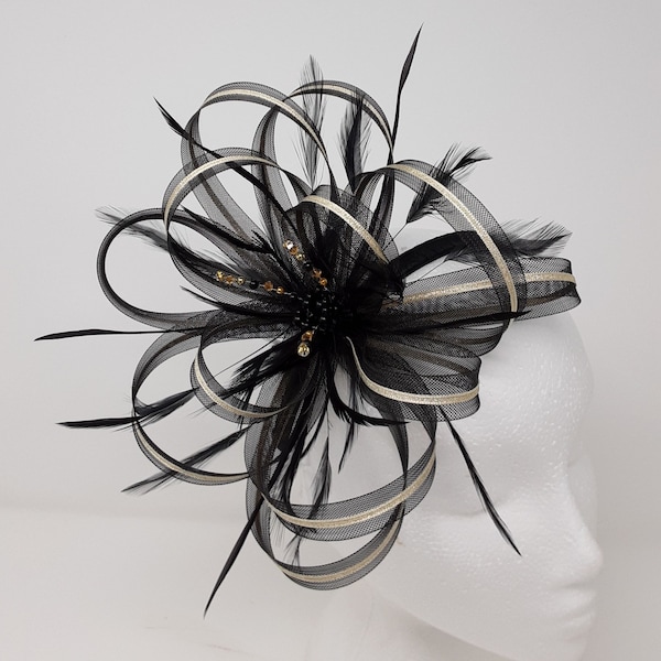 Black and gold fascinator with a touch of sparkling diamantè on clip, comb and Alice band.