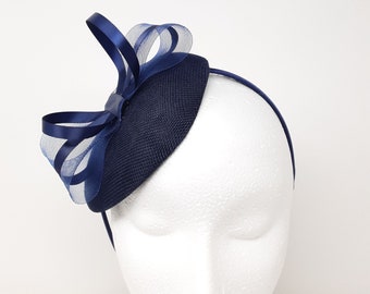 Navy blue button percher style fasinator on a clip, comb and Alice band