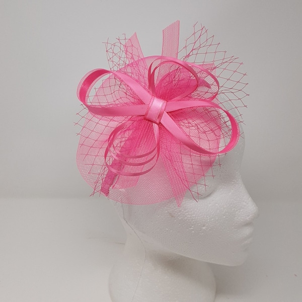 Hot pink dainty fascinator attached to clip, comb and Alice band