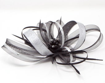 Black fascinator with silver lurex trim, diamantè and centre bead cluster with comb, clip, & alice band.