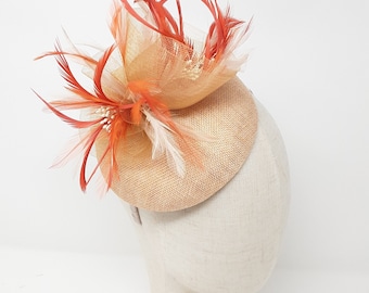 Nude and burnt orange percher fascinator attached to clip, comb and Alice band