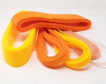 Orange, yellow or peach crinoline for milinery fascinator DIY. Sold by the meter.