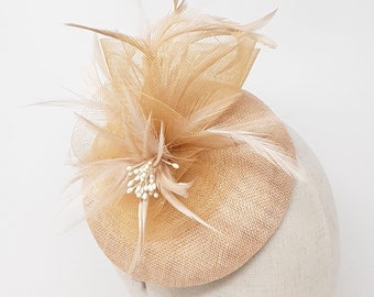 Nude percher fascinator attached to clip, comb and Alice band