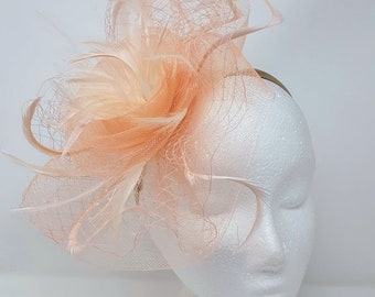 Peach swirl fascinator on a clip, comb and Hair band