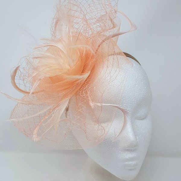 Peach swirl fascinator on a clip, comb and Hair band