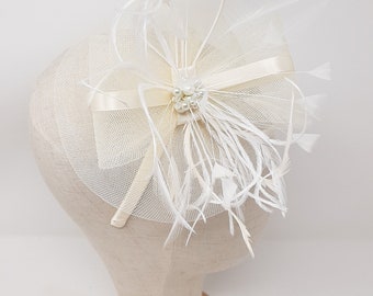 Ivory and pearl fascinator attached to clip, comb and Alice band