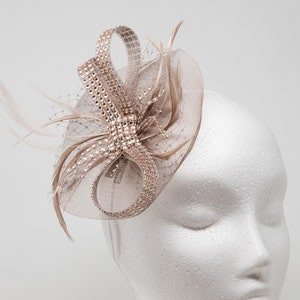 Rose gold shimmer fascinator attached to a clip