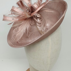 shimmering rose gold hatinator style fascinator with comb, clip, alice band.