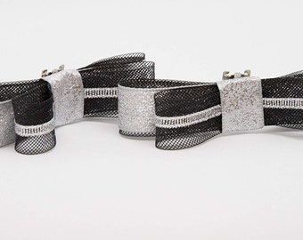 Black and shimmering silver metallic lurex shoe clips …