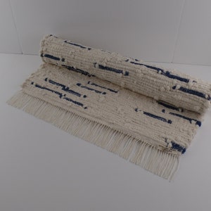 Sailor, a rag rug, handwoven, hand dyed and made especially for you. This rug is color/fast, wash/fast, and machine washable.