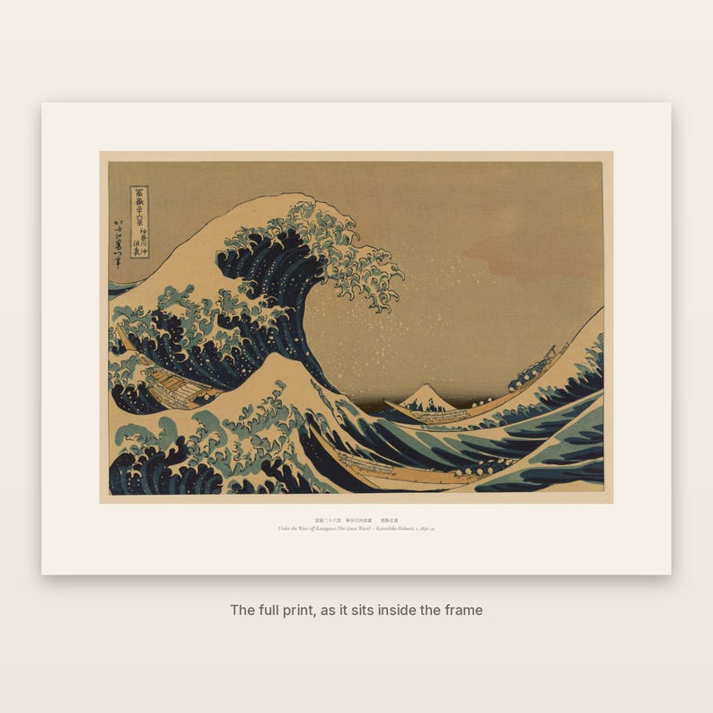 The full print of Hokusai's Great Wave with its washi-tone margin and caption, as it sits inside the frame