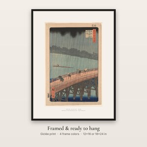 Hiroshige's Sudden Shower in a black frame, ready to hang