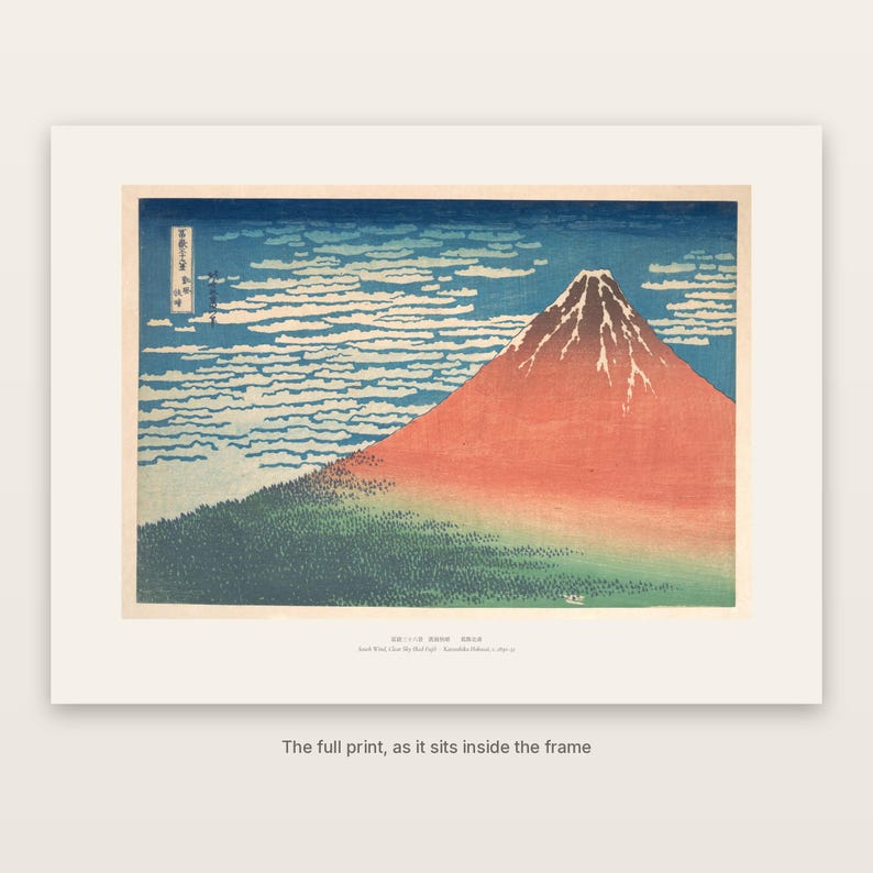 The full print of Hokusai's Red Fuji with its washi-tone margin and caption, as it sits inside the frame