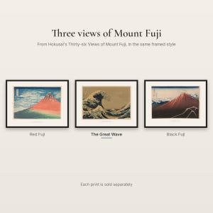 Three views of Mount Fuji from Hokusai's Thirty-six Views of Mount Fuji in the same framed style: Red Fuji, The Great Wave and Black Fuji, each sold separately