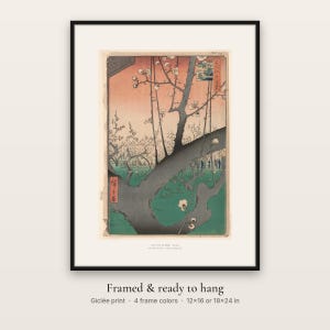 Hiroshige's Plum Park in Kameido in a black frame, ready to hang