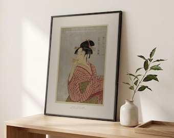 Young Woman Blowing a Poppin Framed Print – Utamaro Ukiyo-e Japanese Woodblock Giclée Art, Ready to Hang