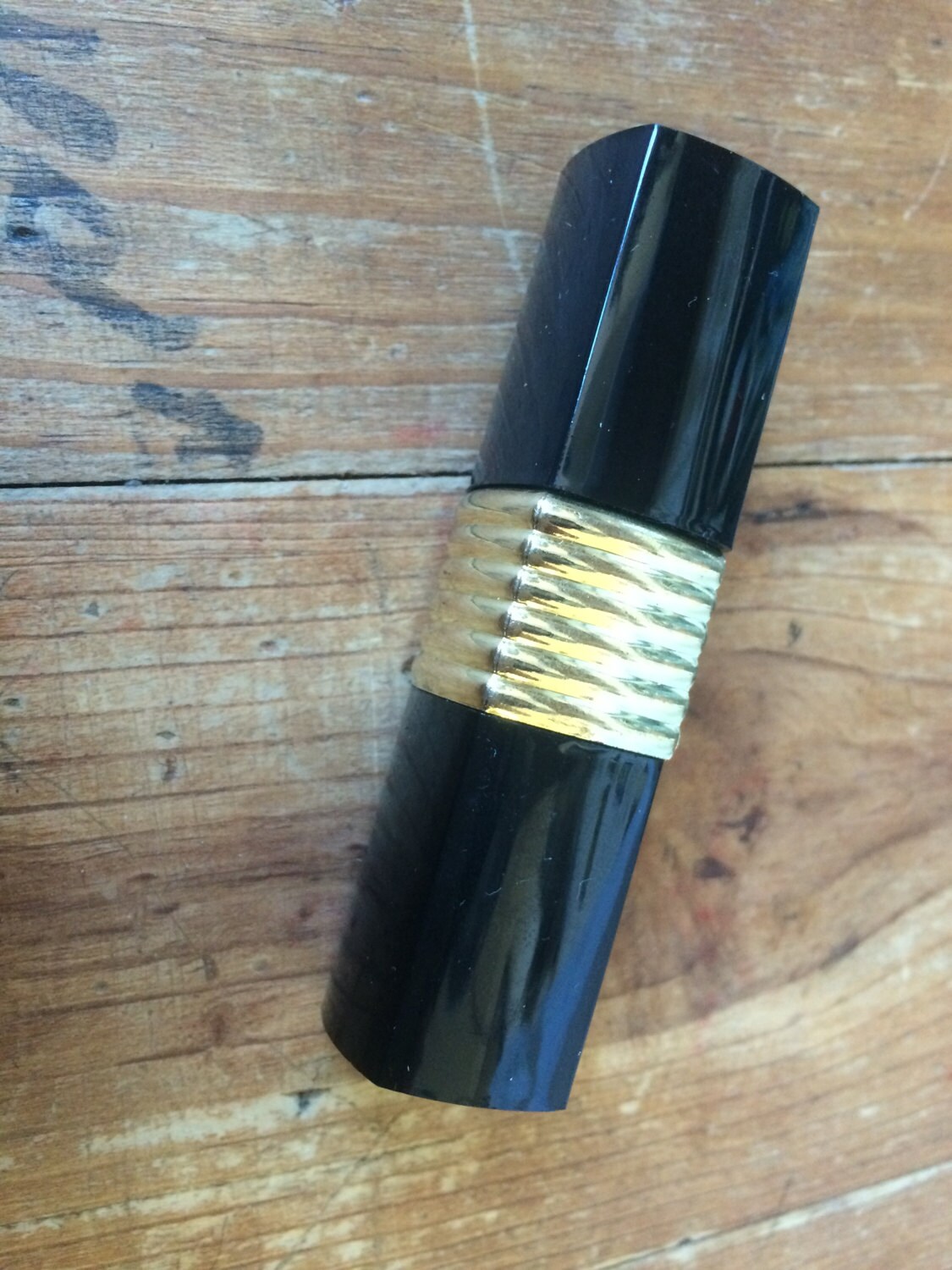 Hidden Lipstick Knife available only in red. Etsy