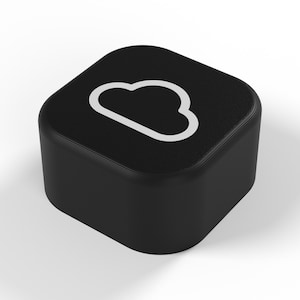 Op de afbeelding: Een vierkant zwart object met afgeronde hoeken voorzien van een witte omtrek van een wolkenpictogram in het midden van de bovenkant. Het object heeft een gladde, matte afwerking en een solide, blokvormige structuur met verticale zijden.