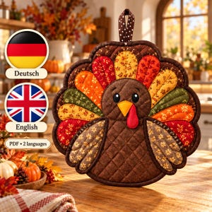 May include: A quilted turkey-shaped potholder featuring a brown body and a fan of colorful fabric feathers in shades of red, orange, yellow, and green with floral patterns. It includes a brown and white polka-dot hanging loop at the top.