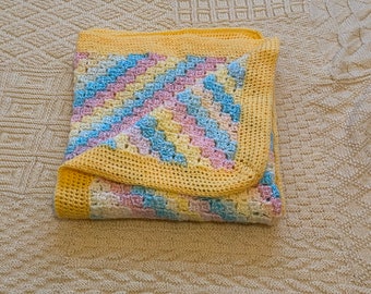 Pastel rainbow crochet lap blanket, hand crocheted baby blanket, corner to corner crochet child’s blanket, cosy winter home decor.