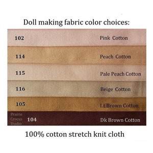May include: Swatch card of 100% cotton stretch knit fabric in various shades of pink, peach, beige, and brown. The fabric swatches are labeled with numbers and names, including Pink Cotton, Peach Cotton, Pale Peach Cotton, Beige Cotton, Lt Brown Cotton, and Dk Brown Cotton.