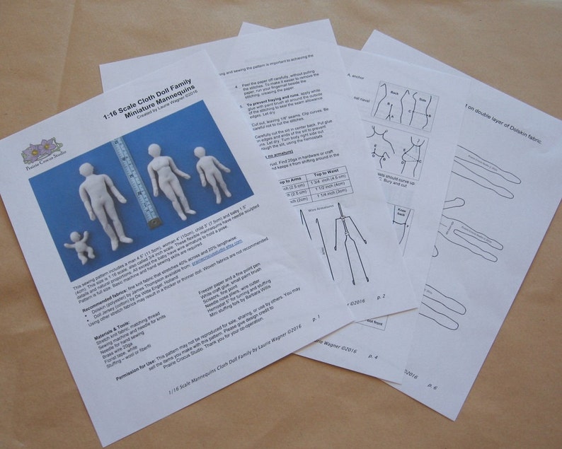 May include: A set of printable patterns for making 1:16 scale cloth doll family mannequins. The patterns include a man, woman, child, and baby. The instructions include a list of recommended fabrics and materials.