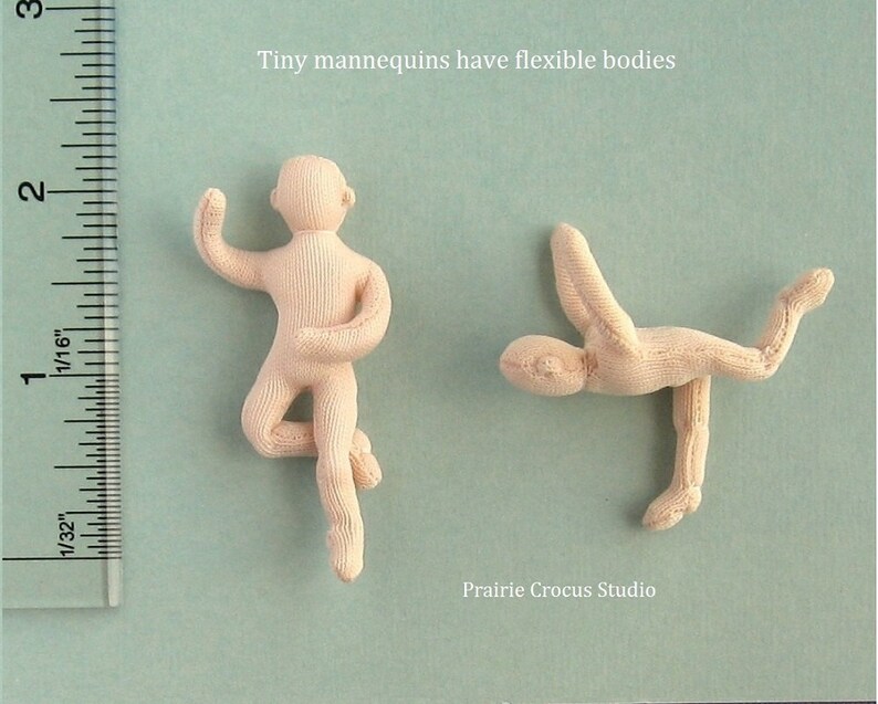 May include: Two small, flexible, beige mannequins posed in different positions. The mannequins are made of fabric and are about 2 inches tall. The text "Tiny mannequins have flexible bodies" is above the mannequins. The text "Prairie Crocus Studio" is below the mannequins.